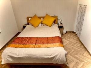 Voodi või voodid majutusasutuse Summit Villa 中崎町駅3分鐘 梅田商圈大阪駅 3階日式傳統町屋 100平超大空間 toas