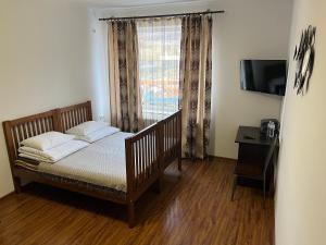 Postel nebo postele na pokoji v ubytování PETROVICH hotel