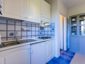 Kuchyň nebo kuchyňský kout v ubytování Apartment La Conchiglia by Interhome