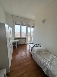 Postel nebo postele na pokoji v ubytování Piazza Vida 12 Palace