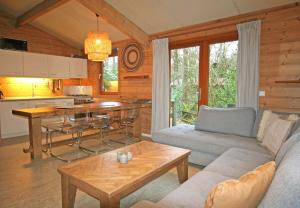 Χώρος καθιστικού στο De Roek Vakantiebungalows