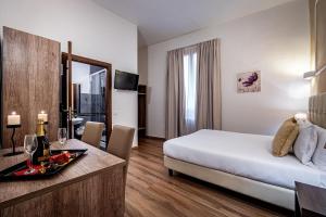 Posteľ alebo postele v izbe v ubytovaní B&B De Biffi