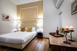 Posteľ alebo postele v izbe v ubytovaní B&B De Biffi