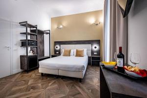 Posteľ alebo postele v izbe v ubytovaní B&B De Biffi