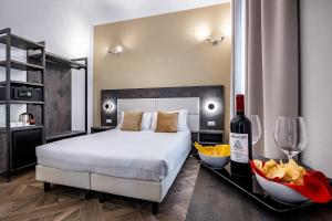 Posteľ alebo postele v izbe v ubytovaní B&B De Biffi