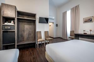 Posteľ alebo postele v izbe v ubytovaní B&B De Biffi