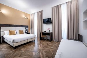 Posteľ alebo postele v izbe v ubytovaní B&B De Biffi
