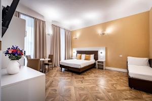 Posteľ alebo postele v izbe v ubytovaní B&B De Biffi