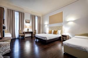 Posteľ alebo postele v izbe v ubytovaní B&B De Biffi