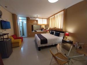 Uma cama ou camas num quarto em Suite Apart Miraflores
