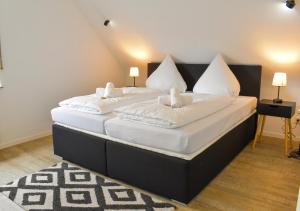 Katil atau katil-katil dalam bilik di Hotel Emmerich +35 gambar