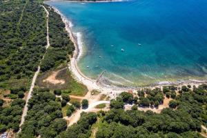 an aerial view of a beach and the ocean at Barbariga Beach Paradise 1 in Peroj