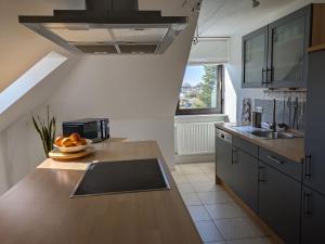 Kuchyň nebo kuchyňský kout v ubytování Ferienwohnung Stollburgblick