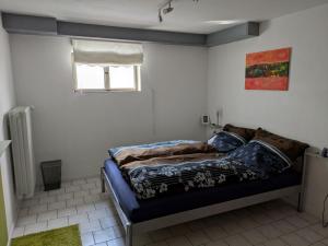 Postel nebo postele na pokoji v ubytování Ferienwohnung Stollburgblick