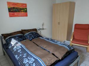 Postel nebo postele na pokoji v ubytování Ferienwohnung Stollburgblick