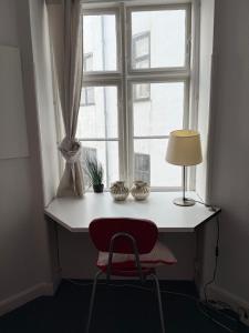 Photo de la galerie de l'établissement Cozy Studio Apartment right next to the City Hall, à Copenhague