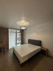 Ένα ή περισσότερα κρεβάτια σε δωμάτιο στο Swimming Paradise Apartments