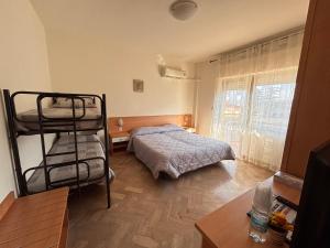 Postel nebo postele na pokoji v ubytování Hotel Crocenzi
