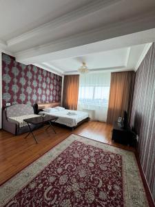 Fotografie z fotogalerie ubytování Sky House Astana v destinaci Astana + 15 fotografií