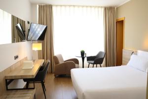 TV a/nebo společenská místnost v ubytování Eurohotel Diagonal Port