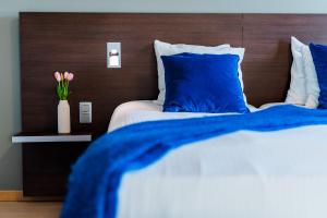 Voodi või voodid majutusasutuse Hotel Falko toas