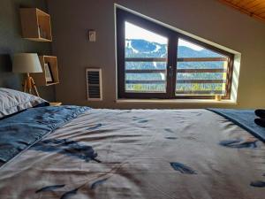 Postel nebo postele na pokoji v ubytování Nordic Sunset Retreat