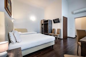 Posteľ alebo postele v izbe v ubytovaní B&B De Biffi