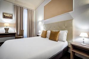 Posteľ alebo postele v izbe v ubytovaní B&B De Biffi