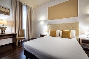 Posteľ alebo postele v izbe v ubytovaní B&B De Biffi
