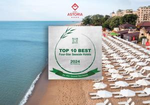 a sign on a beach with chairs and umbrellas at Astoria by Astoria Collection- All Inclusive & Private Beach Club in Golden Sands
