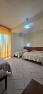 Postel nebo postele na pokoji v ubytování Hotel Ristorante La Decanata