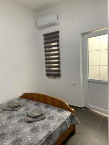 Postel nebo postele na pokoji v ubytování Mariyka Apartaments 2