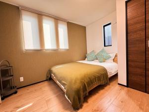 Letto o letti in una camera di Home Stroy in Tokyo - Luxury Villa Minowa&Ueno-三ノ輪一戸建て&東京屋語