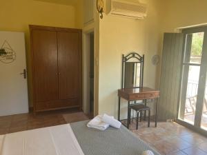Postelja oz. postelje v sobi nastanitve Onar Mani Suites