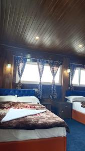 Postel nebo postele na pokoji v ubytování Mountain view homestay Darjeeling