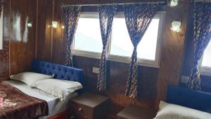 Postel nebo postele na pokoji v ubytování Mountain view homestay Darjeeling