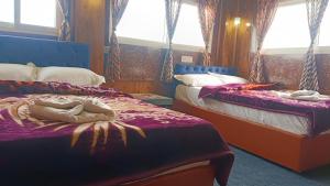 Postel nebo postele na pokoji v ubytování Mountain view homestay Darjeeling