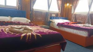 Postel nebo postele na pokoji v ubytování Mountain view homestay Darjeeling