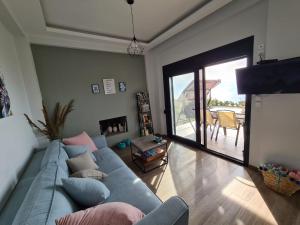 Χώρος καθιστικού στο Paulina's Beach House