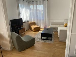 Posezení v ubytování Une Maison en centre ville