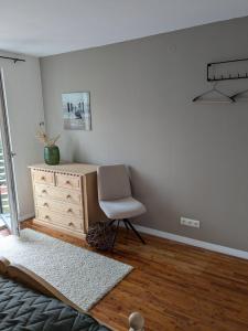 Posezení v ubytování Moderne 70qm OG Wohnung nahe Würzburg, DAA, A3, A7, A81 in Fuchsstadt