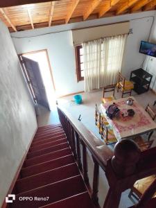 an overhead view of a room with a bed and stairs at Perlablanca in Santa Clara del Mar
