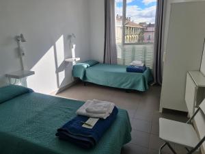 Motion Chueca Hostel客房内的一张或多张床位