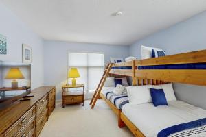 a bedroom with two bunk beds and a desk at Anchorage 7444 in Hilton Head Island +19 photos