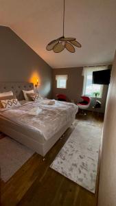 Voodi või voodid majutusasutuse Hotel Fritza toas