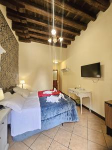 Una cama o camas en una habitación de Hotel GIUBILEO