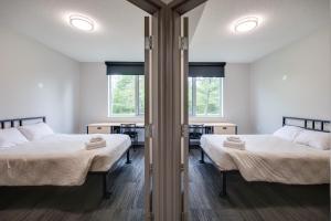 Voodi või voodid majutusasutuse Residence & Conference Centre - Brampton toas