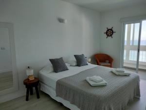 Postel nebo postele na pokoji v ubytování Apartamento mágico con vistas al mar