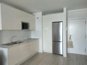 Kuchyň nebo kuchyňský kout v ubytování Apartamento mágico con vistas al mar