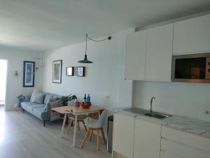 Kuchyň nebo kuchyňský kout v ubytování Apartamento mágico con vistas al mar